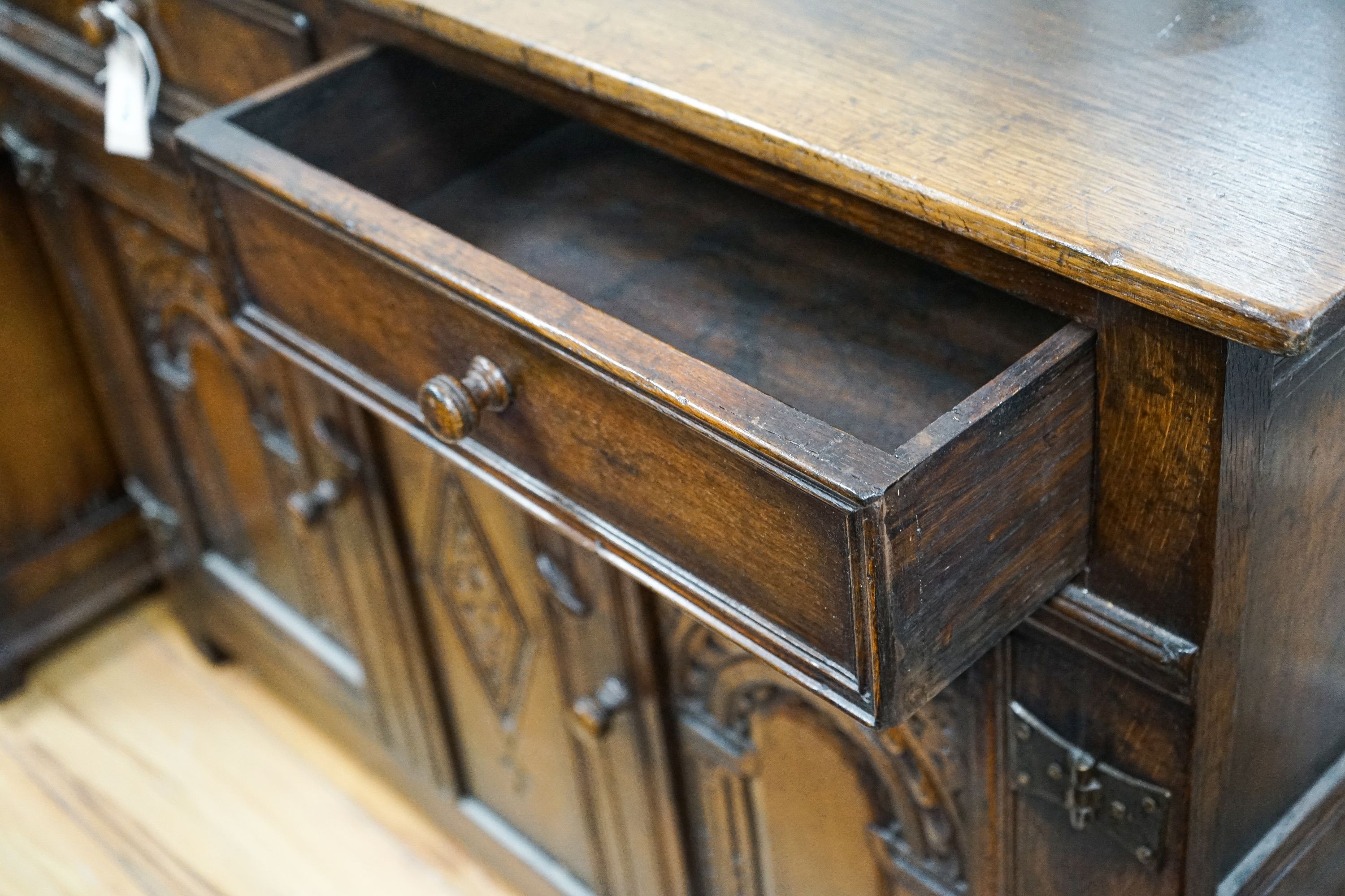 A Titchmarsh and Godwin oak side cabinet, width 107cm, depth 33cm, height 76cm